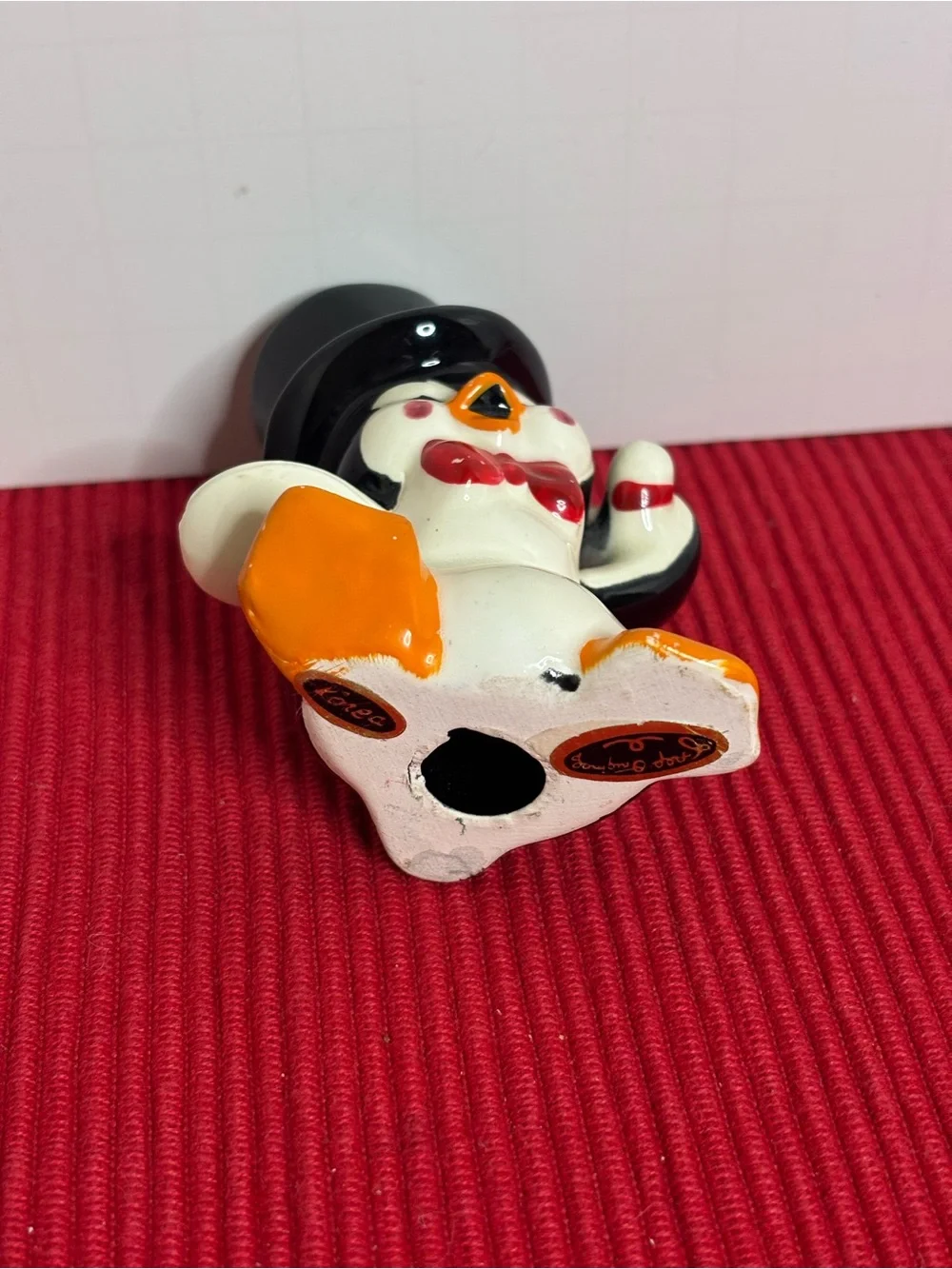 Festive Ceramic Penguin Figurine Holiday Decoration - Black & Orange